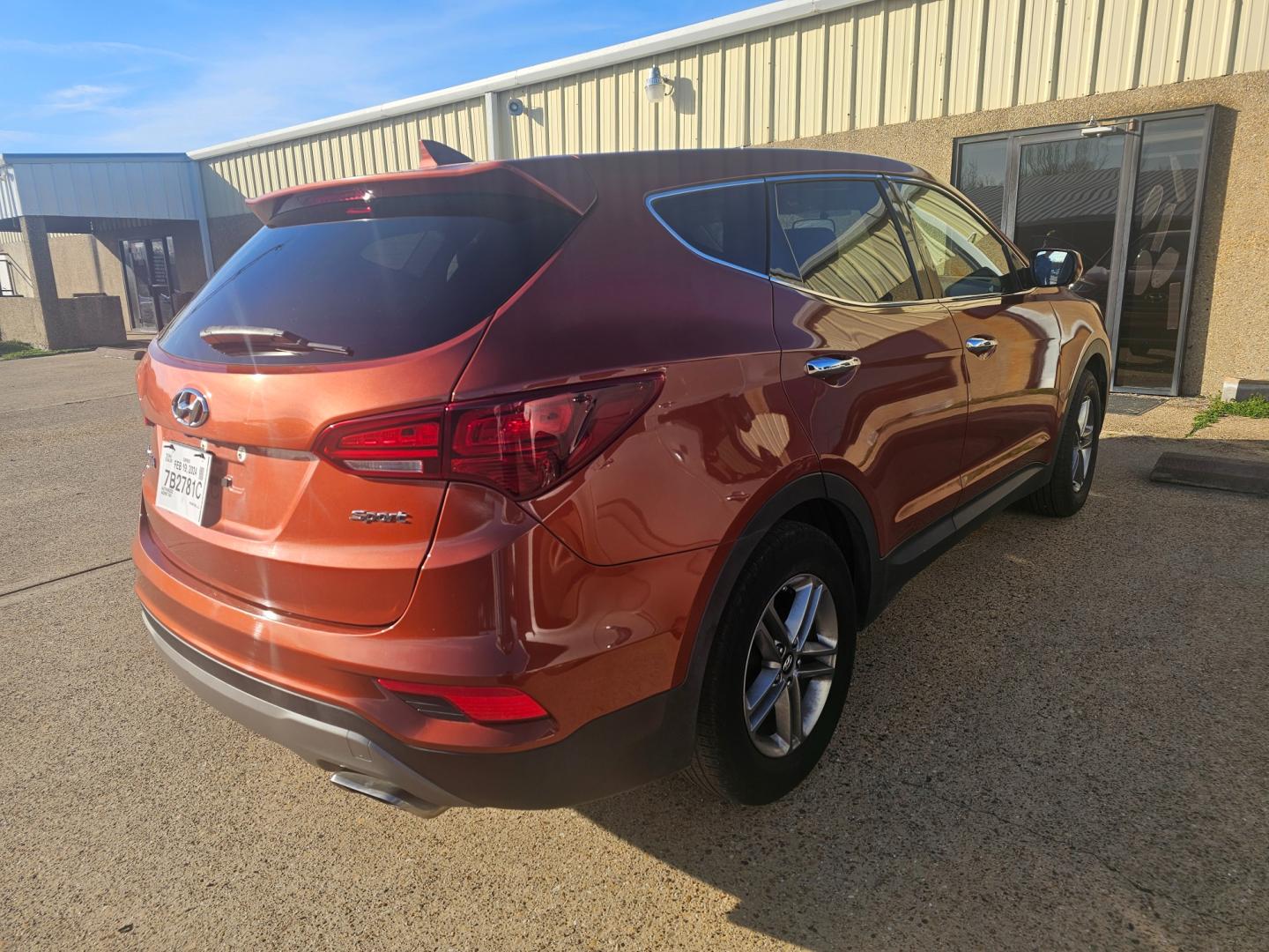 2017 ORANGE Hyundai Santa Fe Sport 2.4 FWD (5XYZT3LB6HG) with an 2.4L L4 DOHC 16V engine, 6A transmission, located at 533 S Seven Points BLVD, Seven Points, TX, 75143, (430) 255-4030, 32.313999, -96.209351 - Photo#2